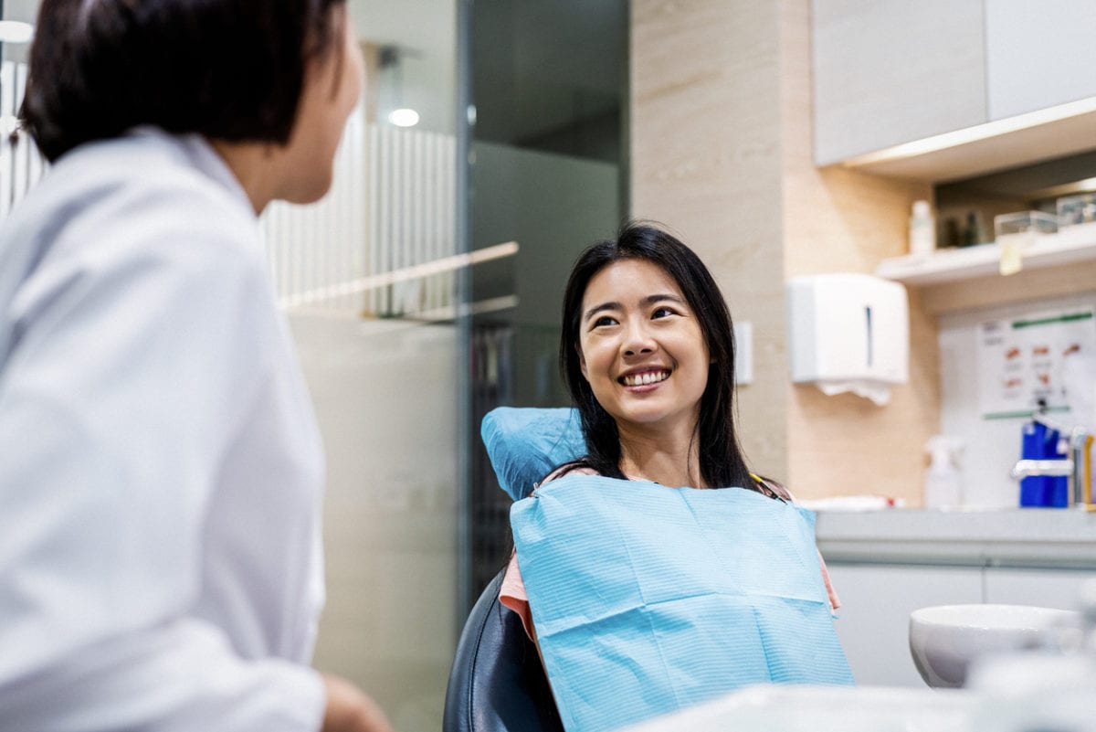 woman at the orthodontist for adult braces