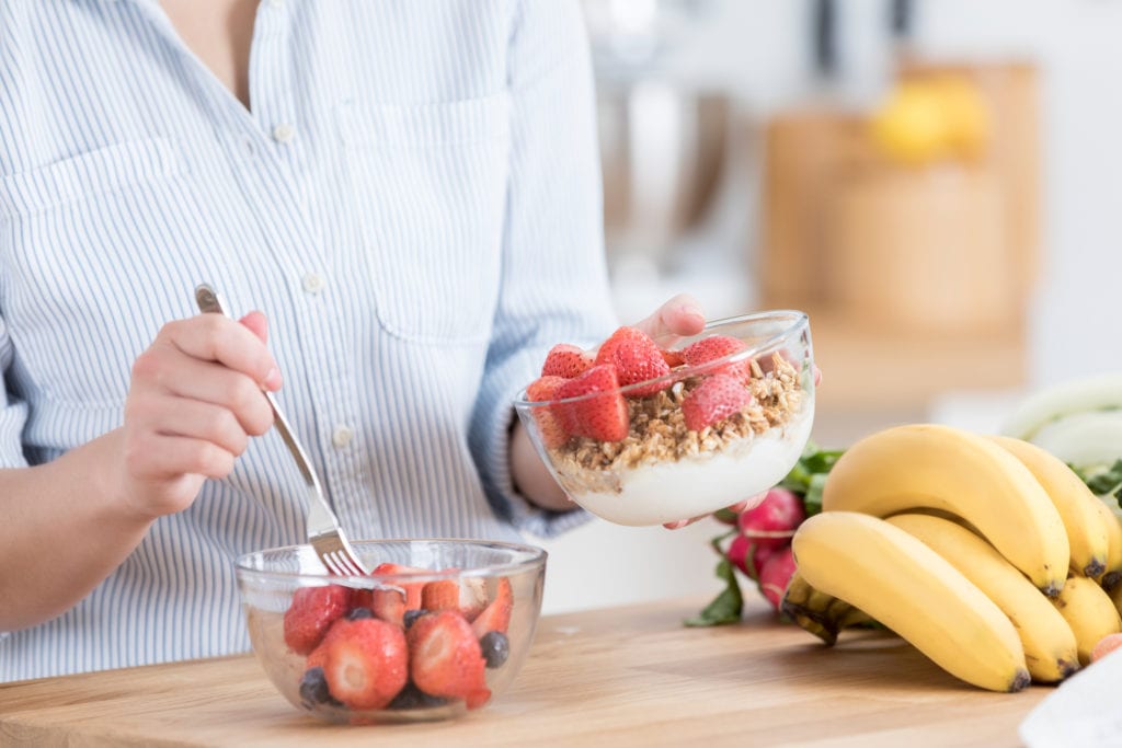 Soft fruit, yogurt, and granola bowl, kids orthodontist concept