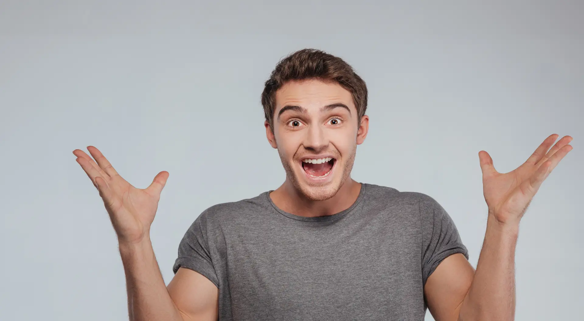Financing - Gulf Coast Orthodontics young man smiling with surprised look