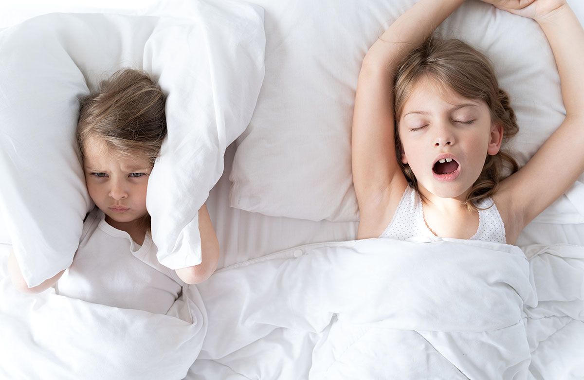 little girl snores and keeps her sister awake Young girl's snoring keeps her little sister awake. Nasal breathing is crucial for your child's development